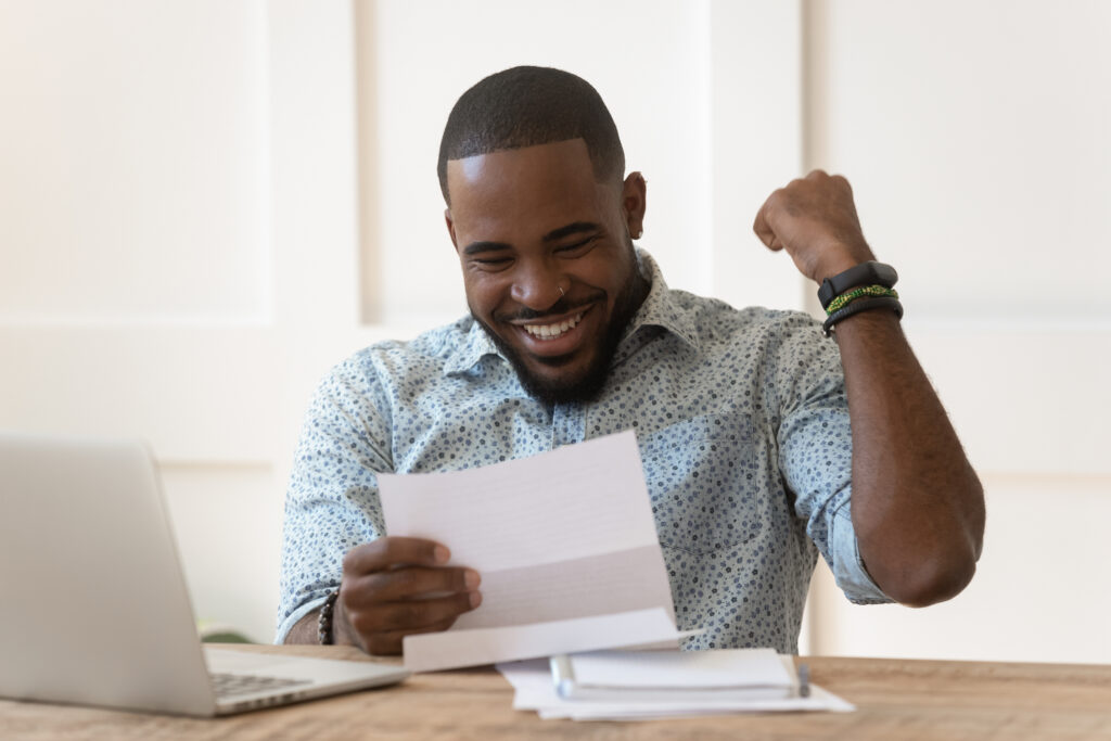 Man opens pre-settlement offer with excitement