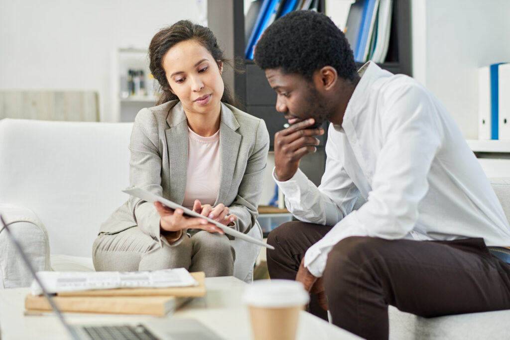 Man looks through pre-settlement funding options