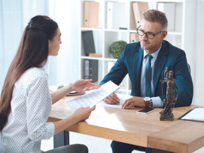Product liability victim meets with lawyer to discuss case