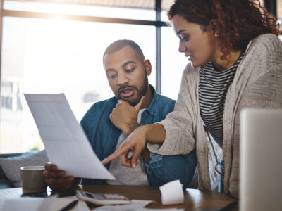 Couple pays bills together with pre-settlement money